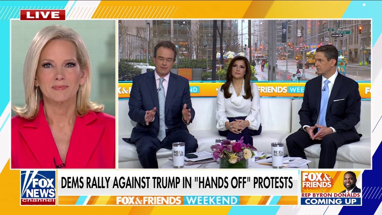 Dems rally against Trump in 'Hands off' protest of the president's policies