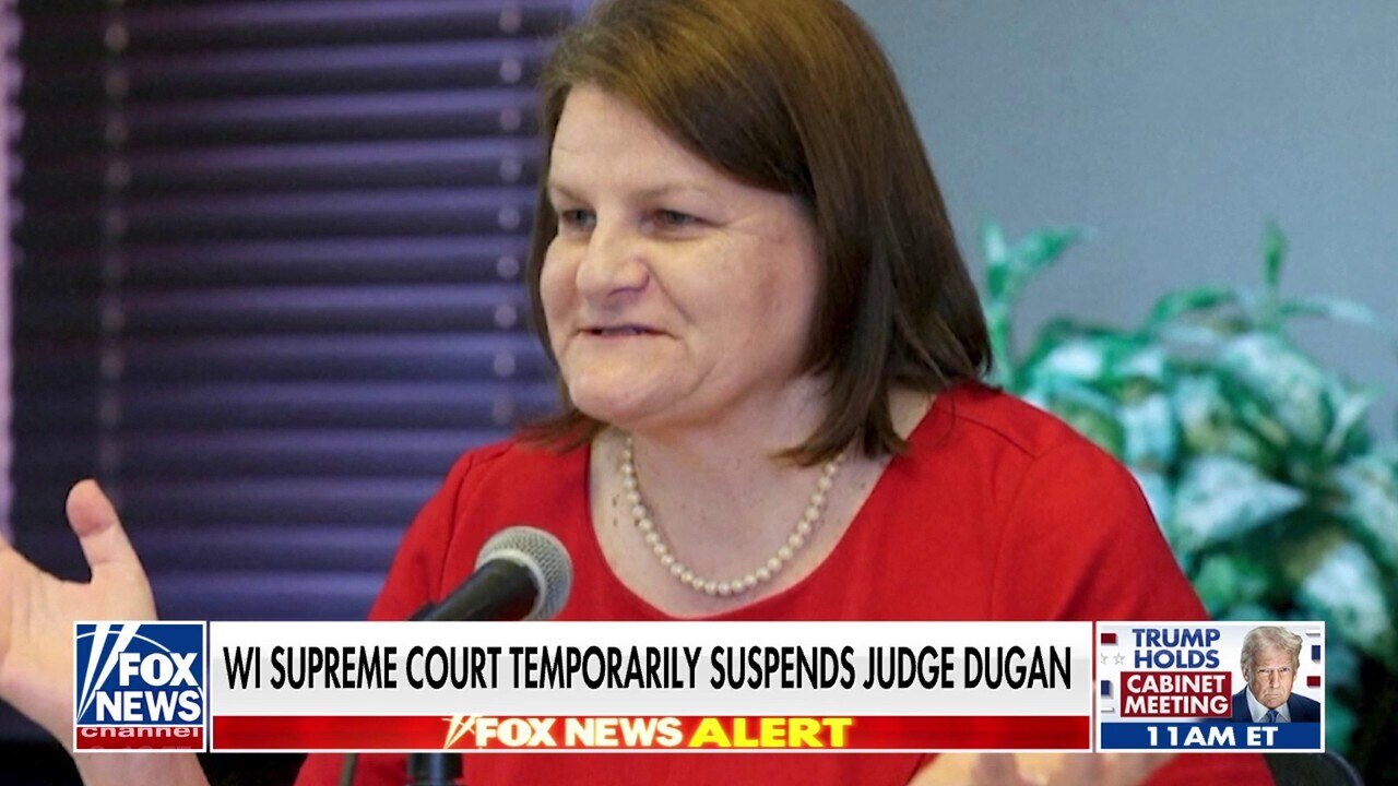 Judge temporarily suspended after arrest for aiding illegal immigrant