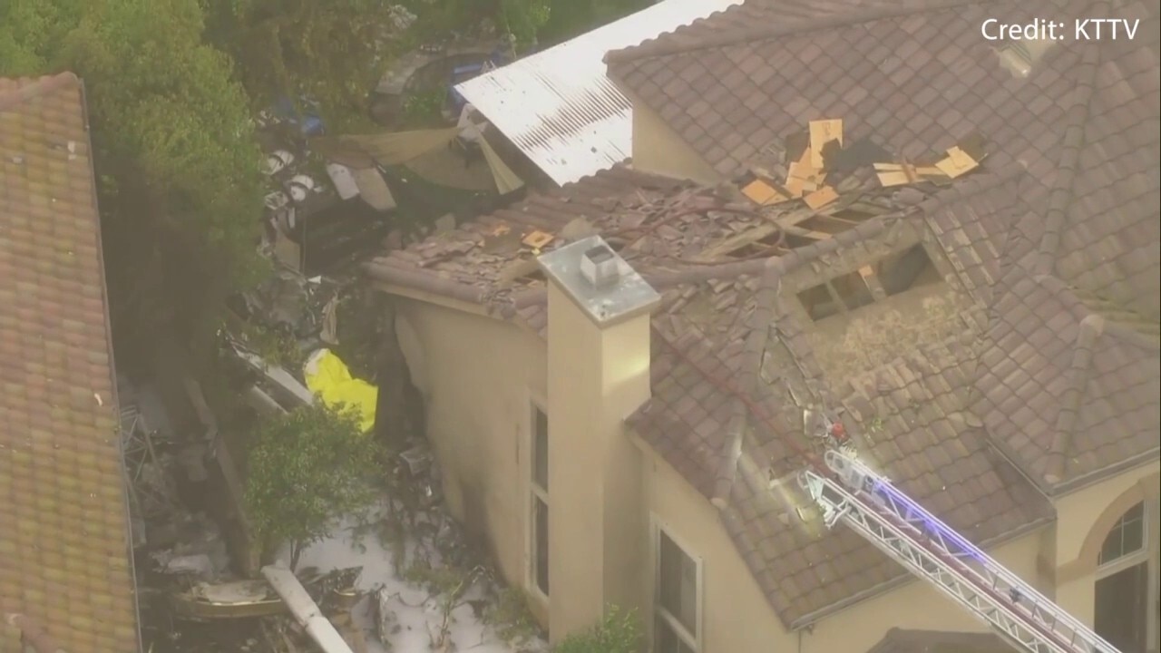 Small plane makes fiery crash into 2 California homes