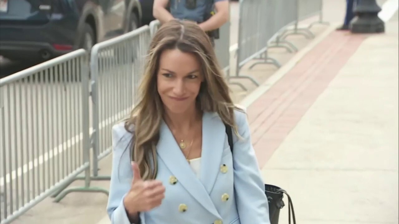 Karen Read flashes thumbs up, tells reporters she 'feels great' after delay stalls trial