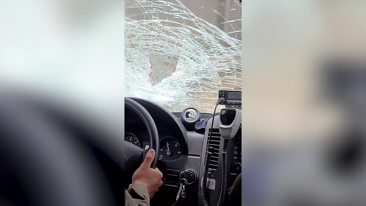 Border Patrol agents' government vehicle pelted with rocks