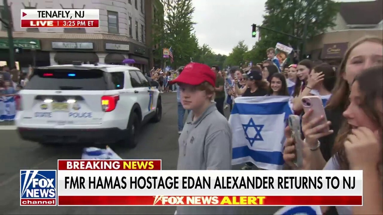 Freed hostage Edan Alexander returns home as families gather in 'celebration of love'
