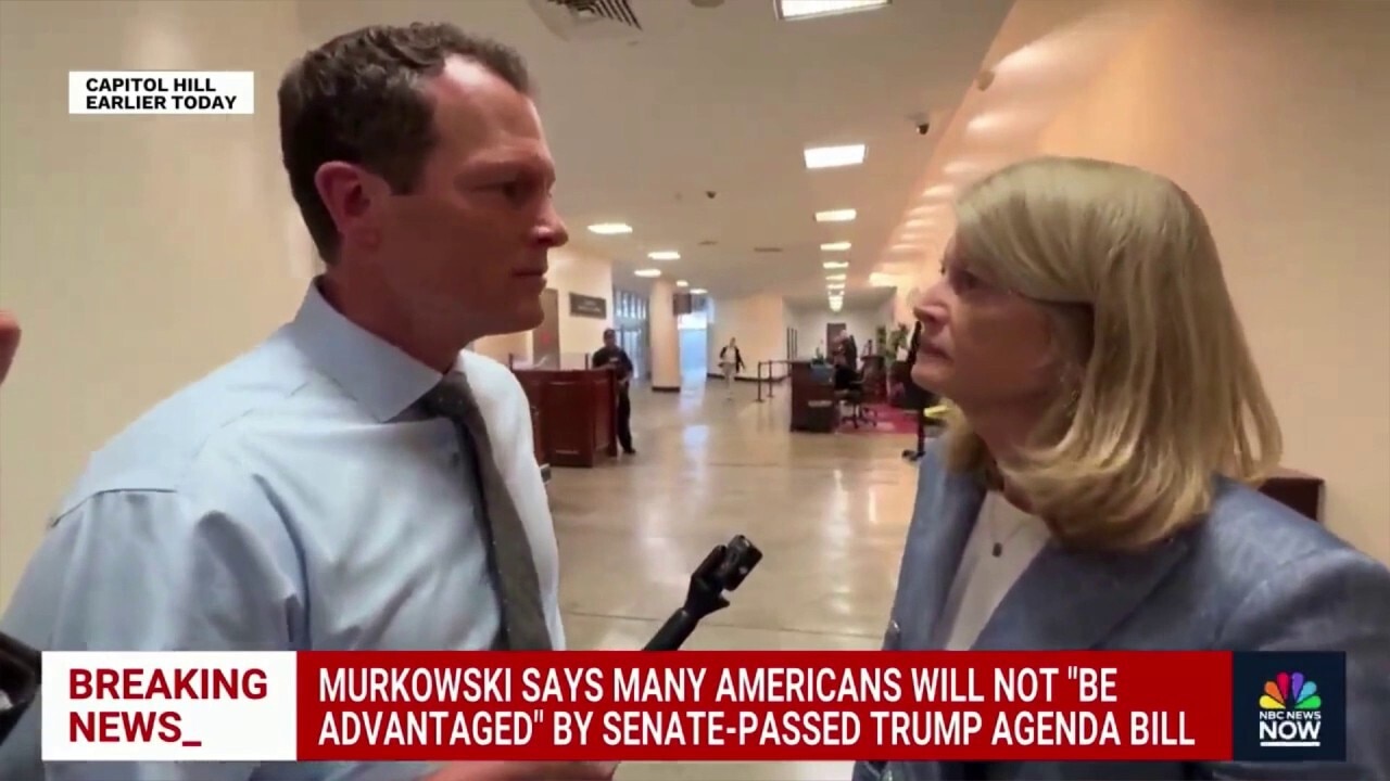 Murkowski stares down reporter questioning vote on Trump spending bill