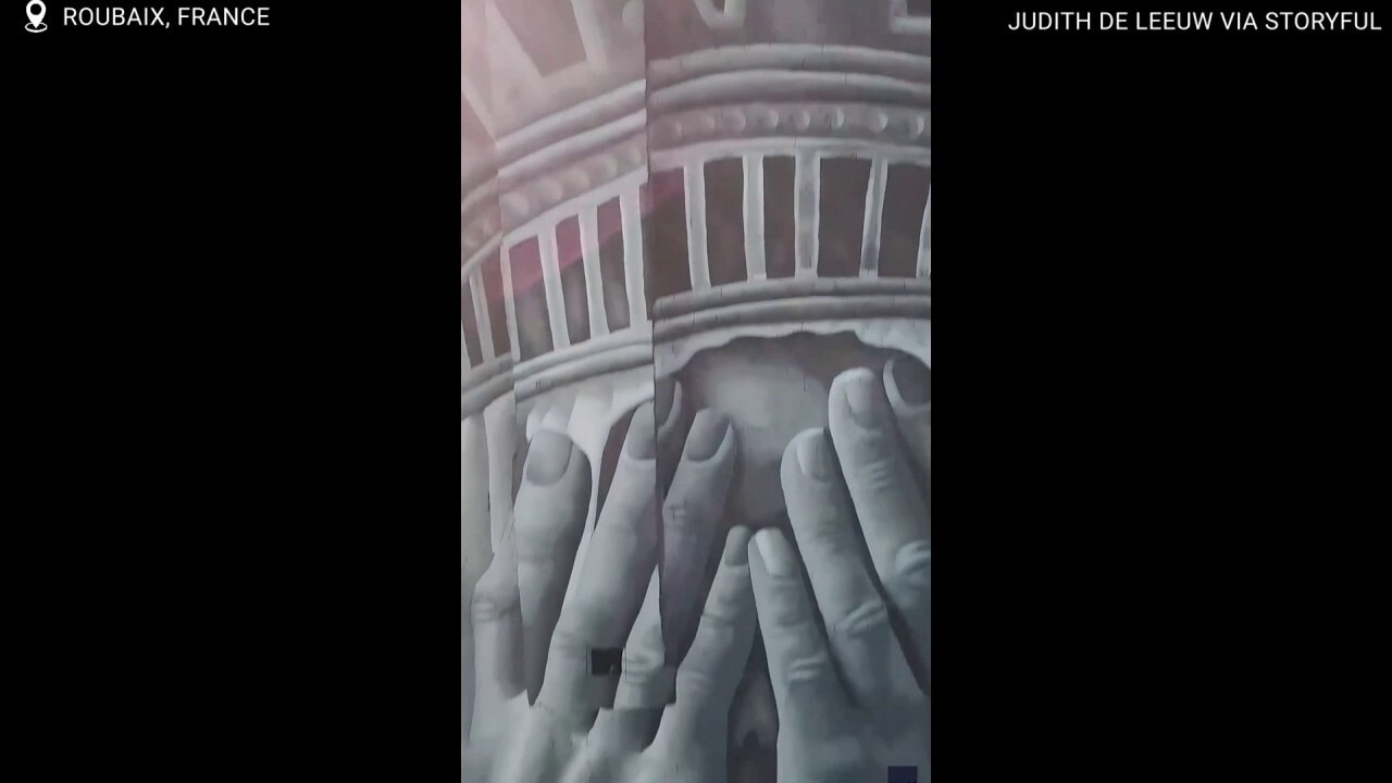 See controversial Statue of Liberty mural in France that's sparking immigration debate