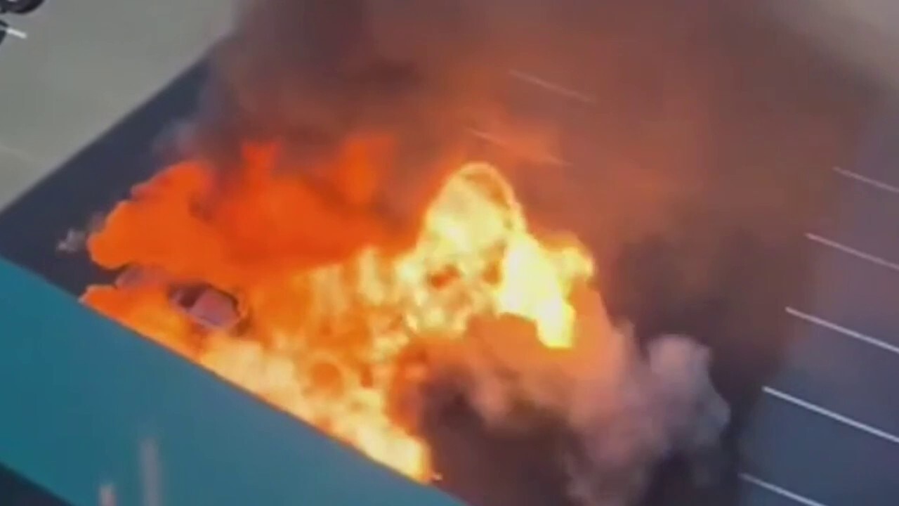 Blast erupts in Arlington as car bursts into flames