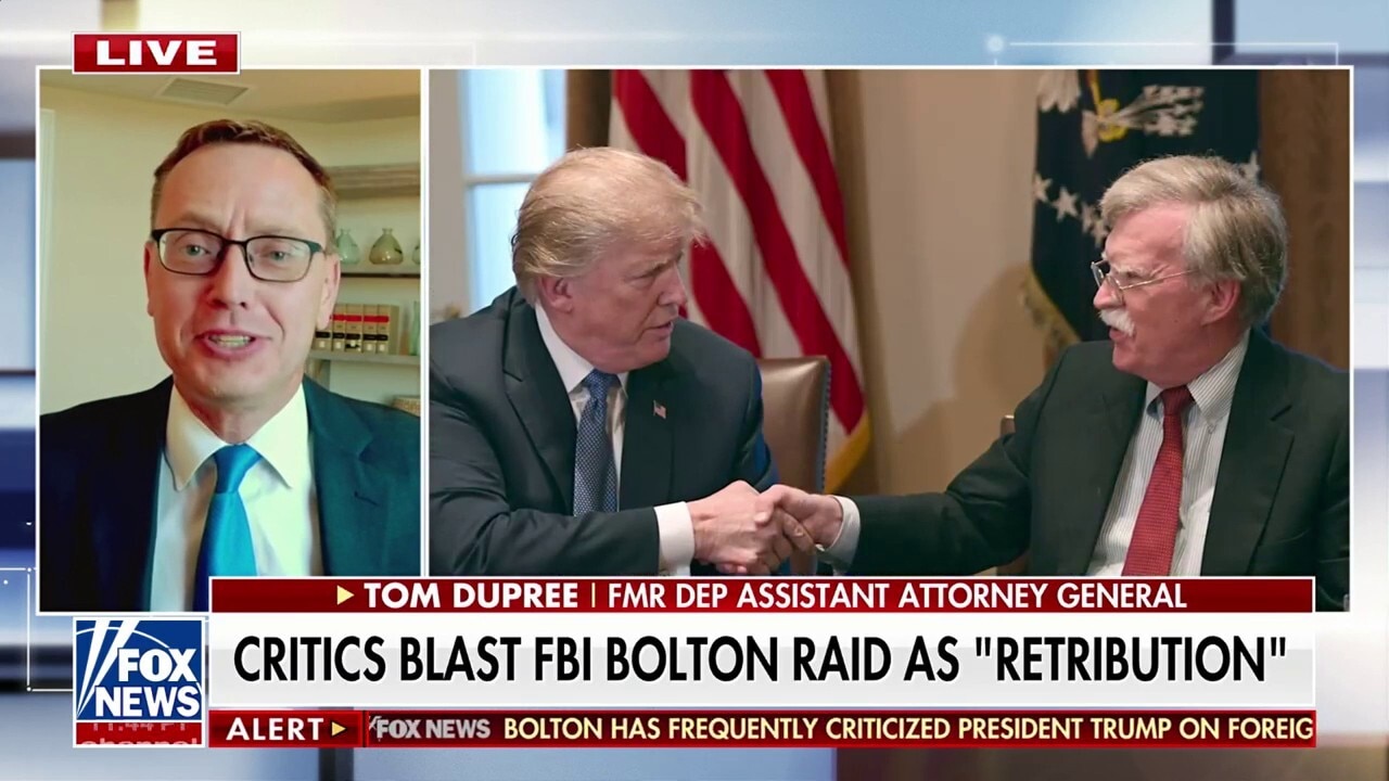 Critics call John Bolton FBI raid 'political retribution'