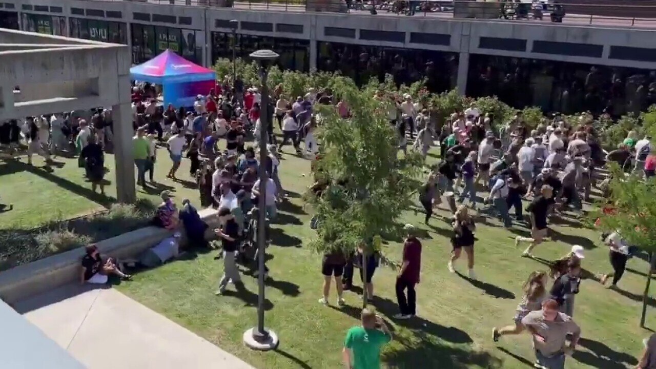People run after Charlie Kirk shot at event