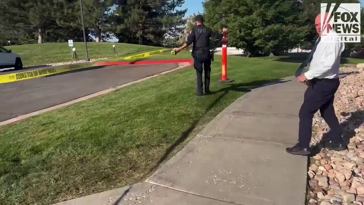 Police tape off the crime scene where Charlie Kirk was shot