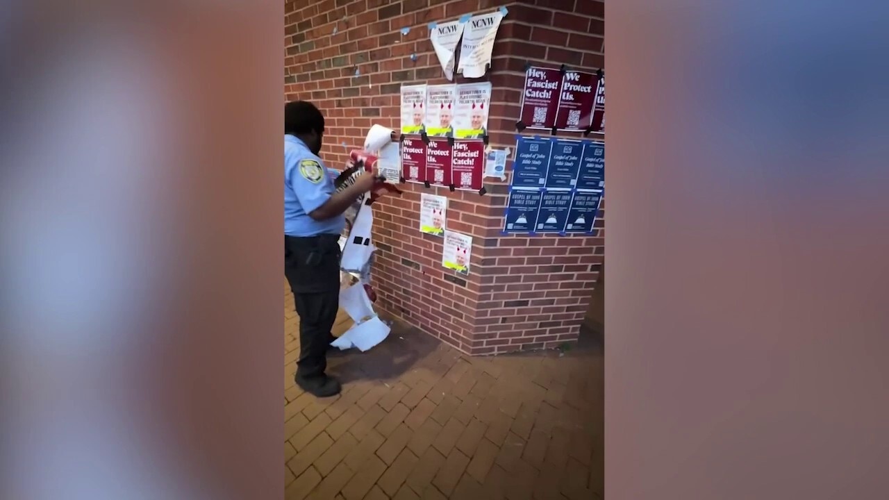 Georgetown University Police Department officer spotted removing “Hey fascist! Catch!” flyers from campus
