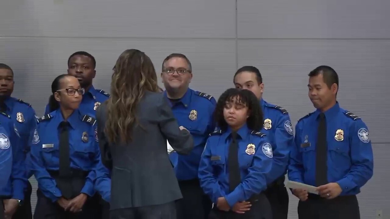Noem hands out bonus checks to Houston TSA employees who worked during government shutdown