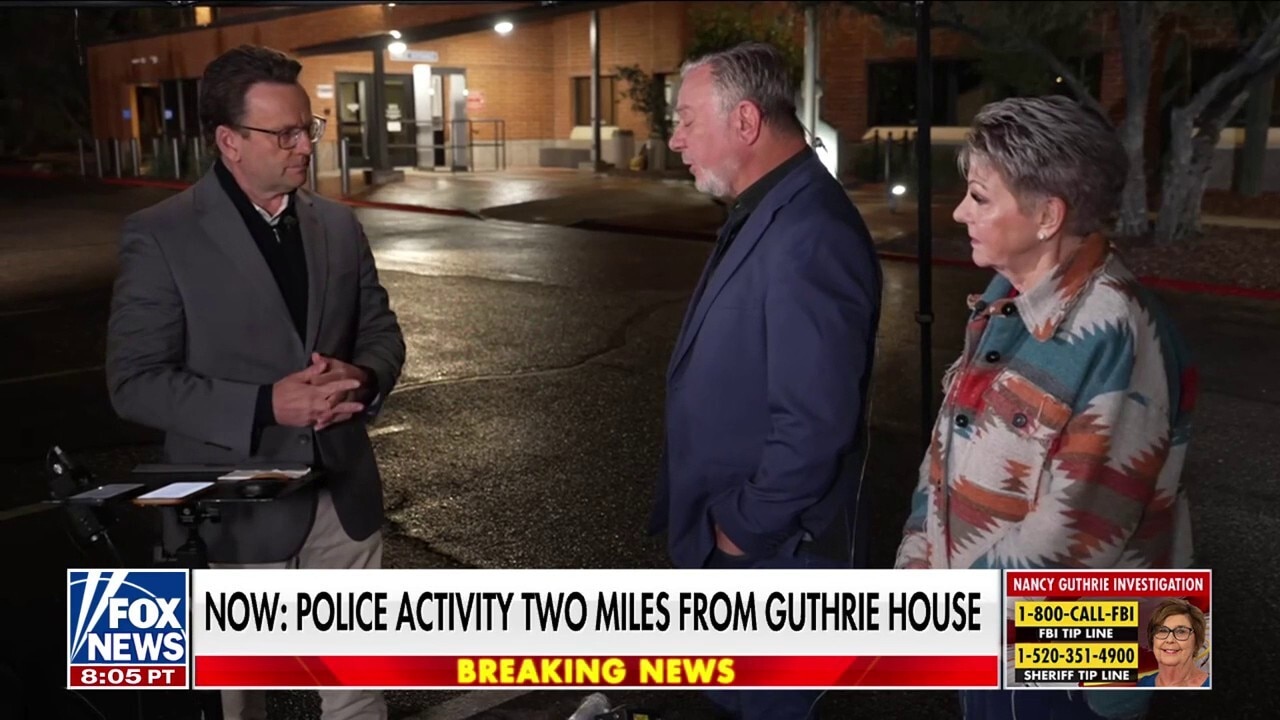 SWAT, mobile command center at location two miles from Guthrie home