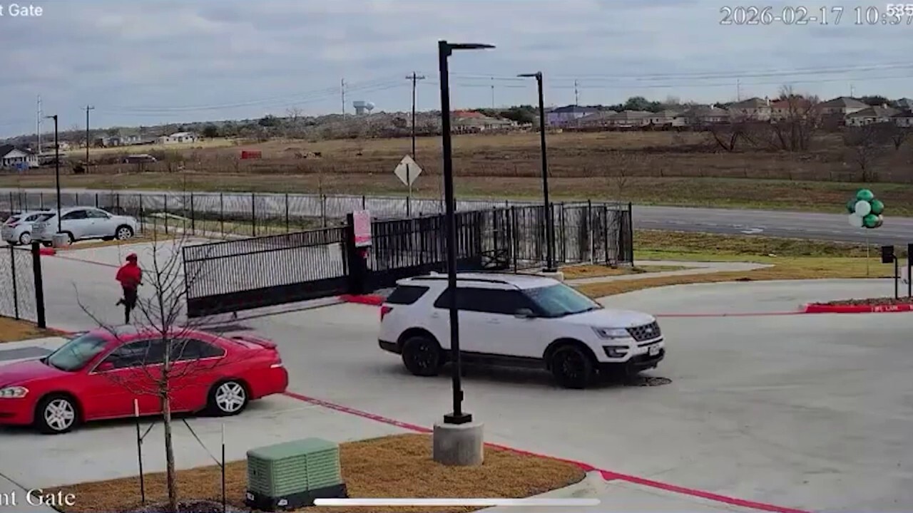 Man seen on video running, firing gun during car repossession