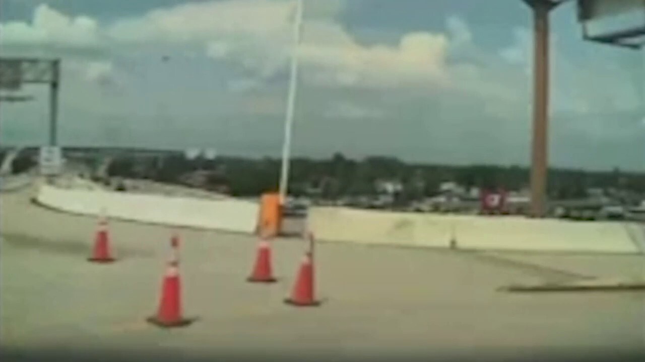 Dashcam video shows Tesla Cybertruck crash into overpass barrier