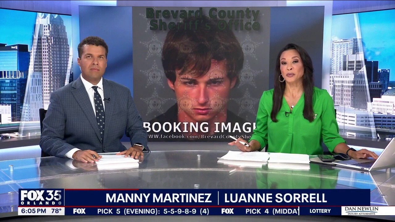 Man charged after human remains found in suitcase