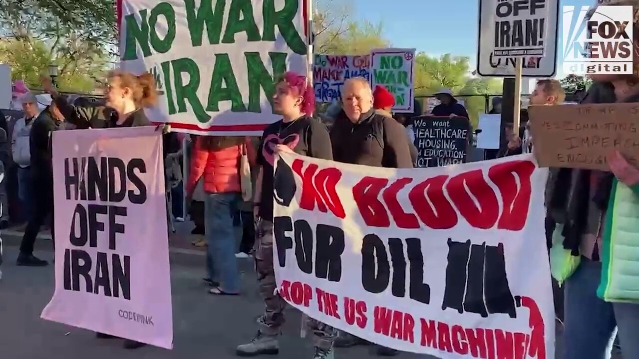 Left Protesters Watch Far-left protesters blur messages against Israel, the US at a ...