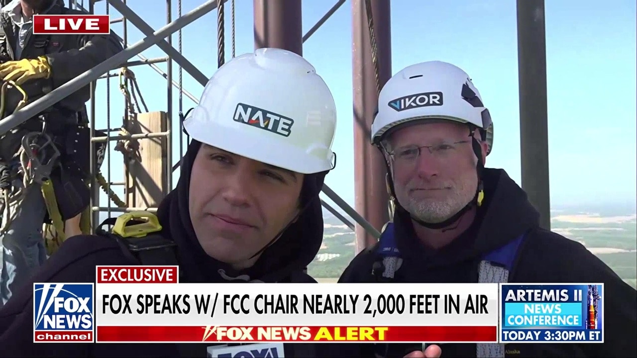 FCC chairman climbs 2,000-foot broadcast tower