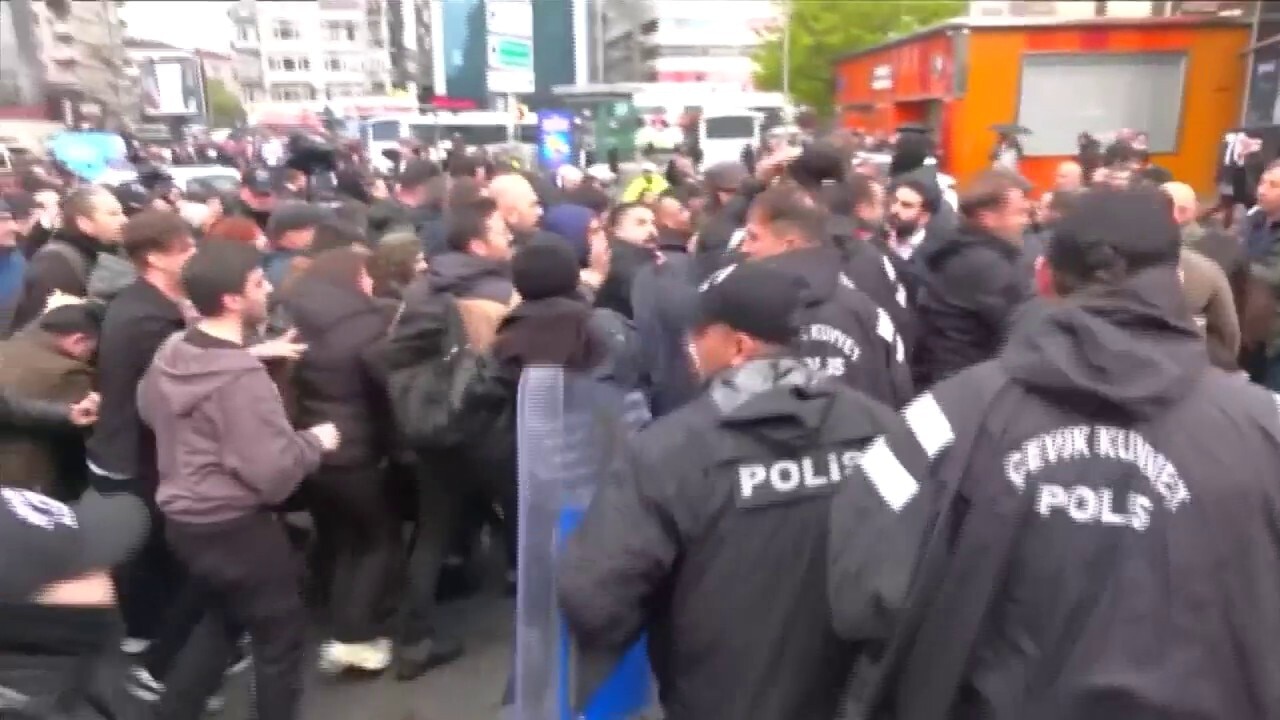 Police and protesters clash during Istanbul May Day march in Turkey