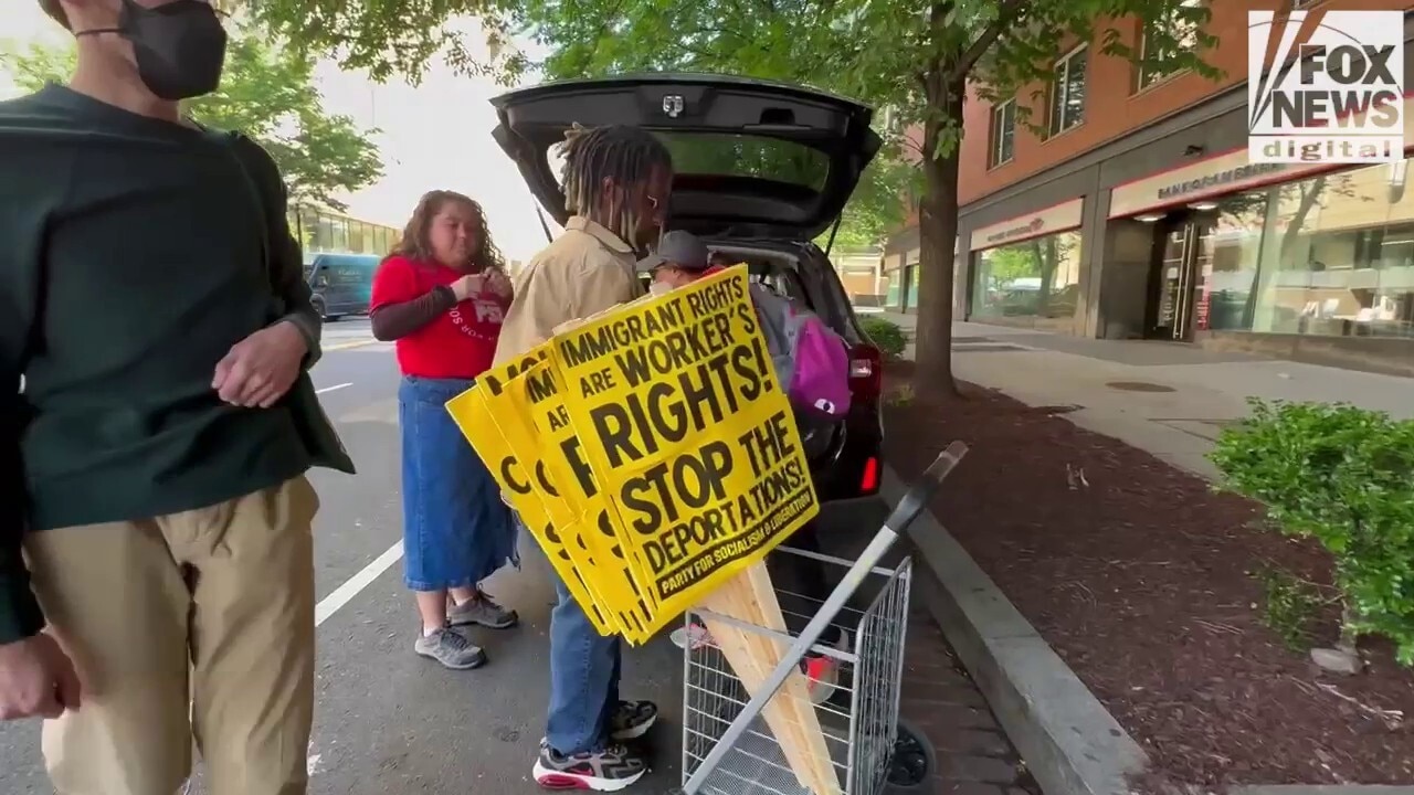 Pro-socialism activists unload supplies ahead of May Day demonstrations in DC
