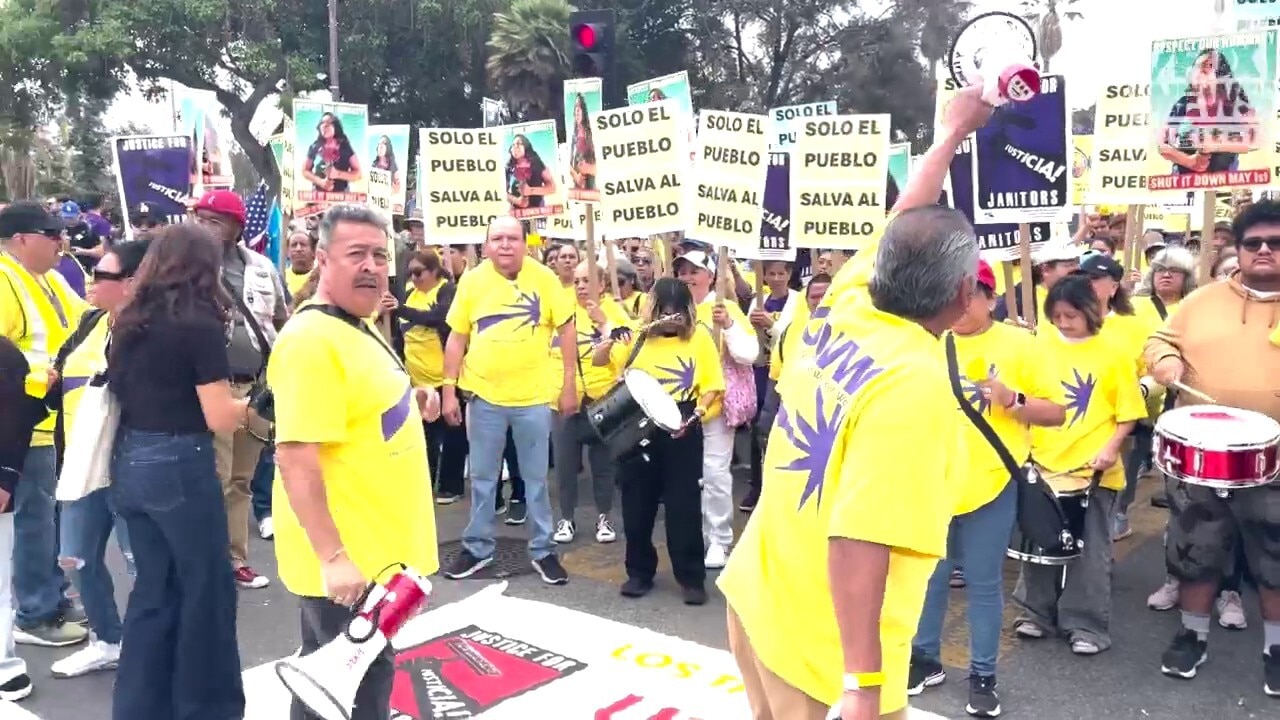 SEIU activists rally at a May Day march in LA