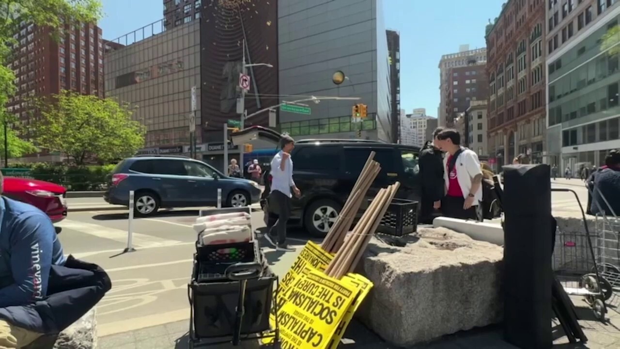 Neville Roy Singham-backed organizations unload protest materials at the May Day demonstration in NYC