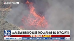 Fast-moving California brush fire scorches hundreds of acres