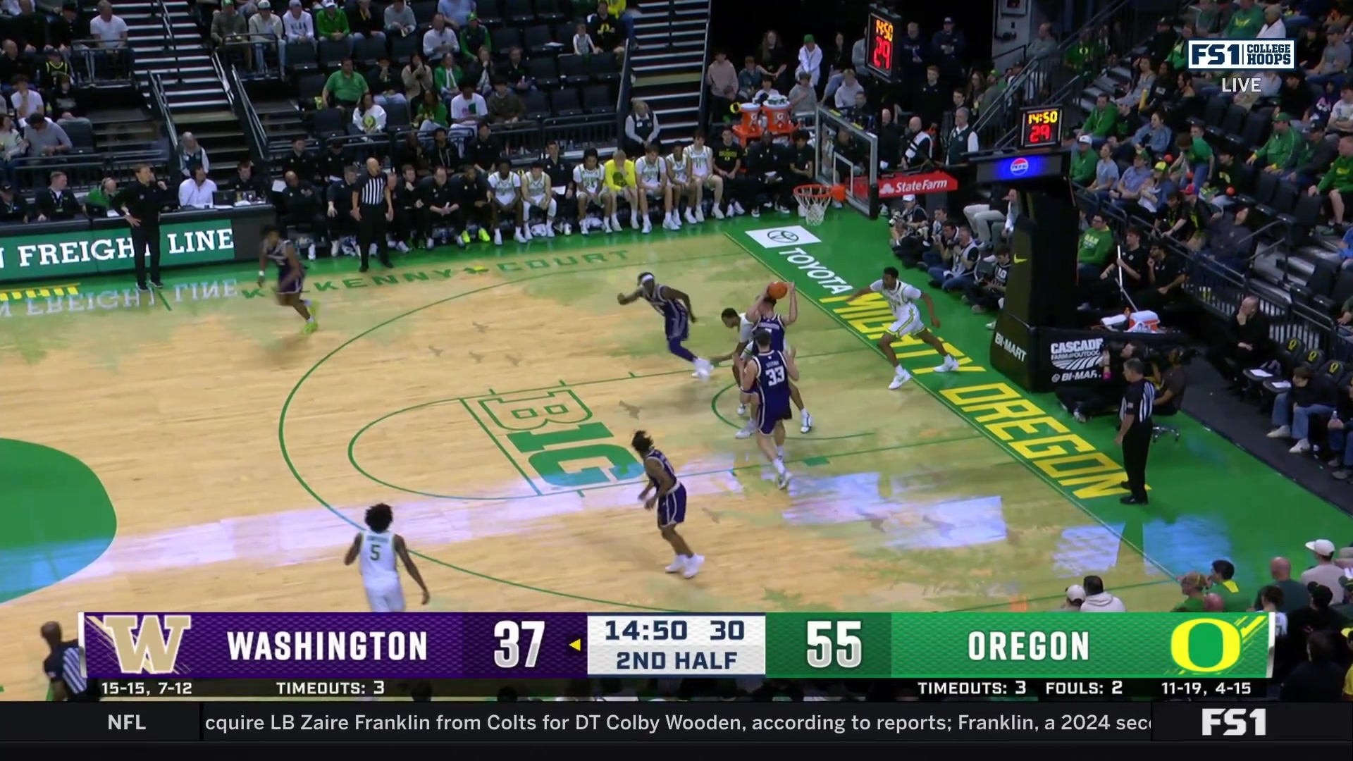 Wesley Yates III sinks a three-pointer for Washington