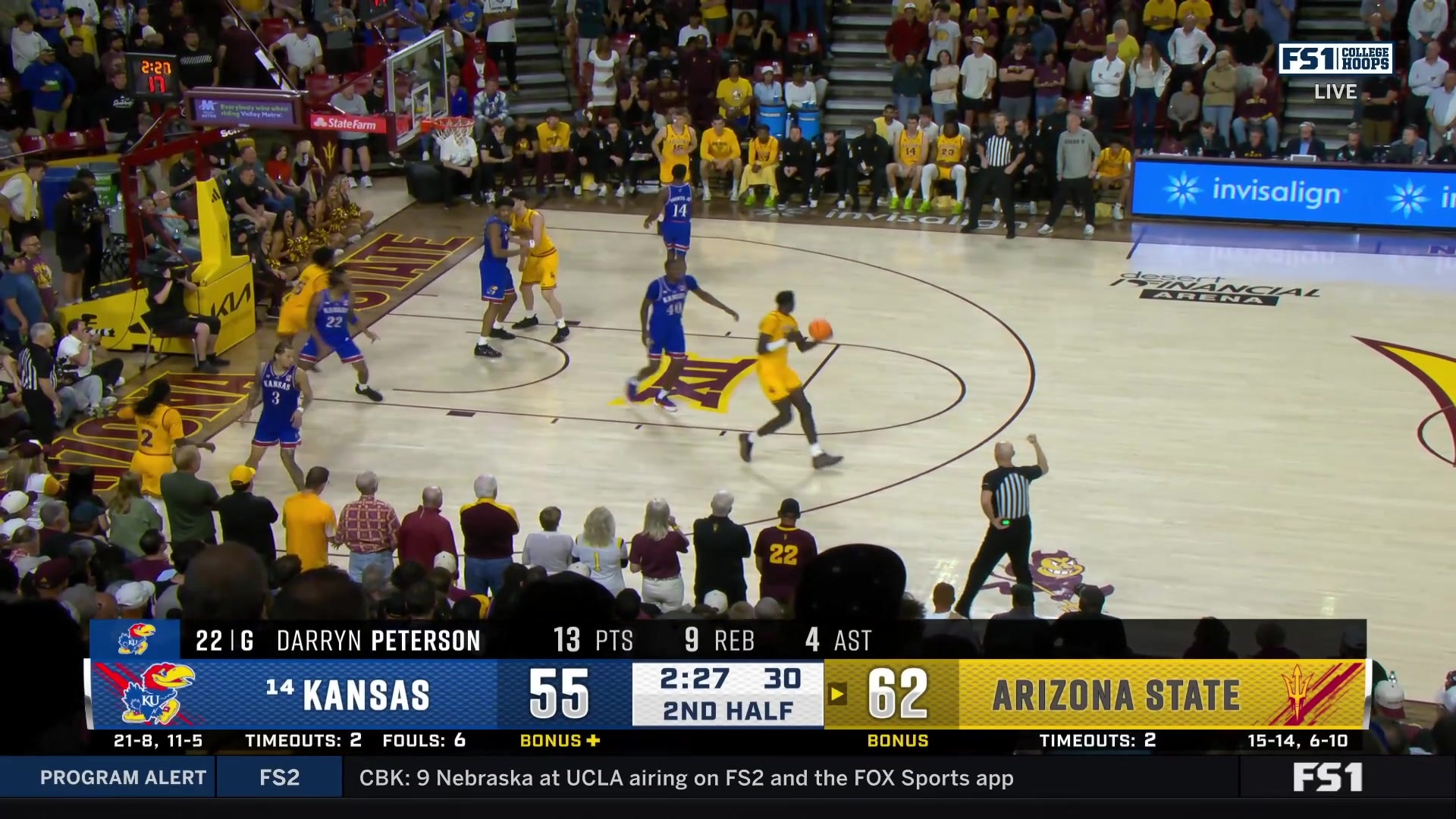 Massamba Diop grabs the offensive board and slams it home