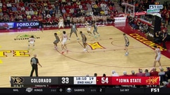 Killyan Toure scores an acrobatic layup and draws a foul