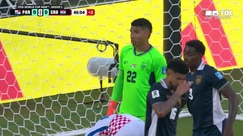 Martin Baturina's strong shot is saved by the goalkeeper