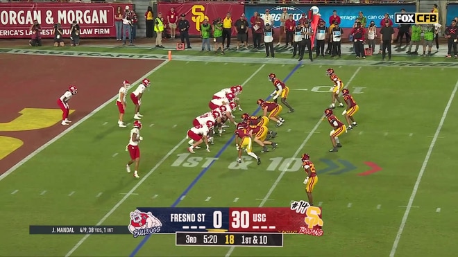 Alex Graham sacks Jayden Mandal in the end zone for a safety