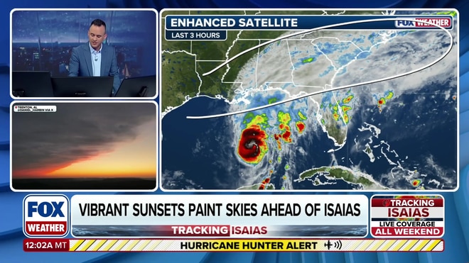 Vibrant sunsets signal wind shear battle with Hurricane Isaias
