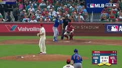 Michael Busch hits a sacrifice fly, scoring Dansby Swanson