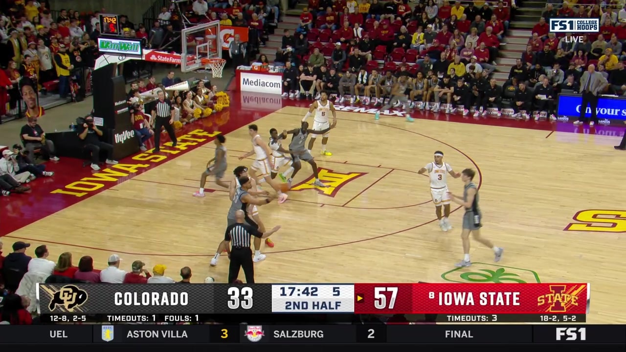 Milan Momcilovic sinks a three-pointer off an assist from Joshua Jefferson