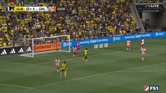 Roman Celentano makes a diving save on Cucho Hernández's shot