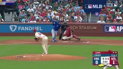 Michael Busch rips an RBI single to center field