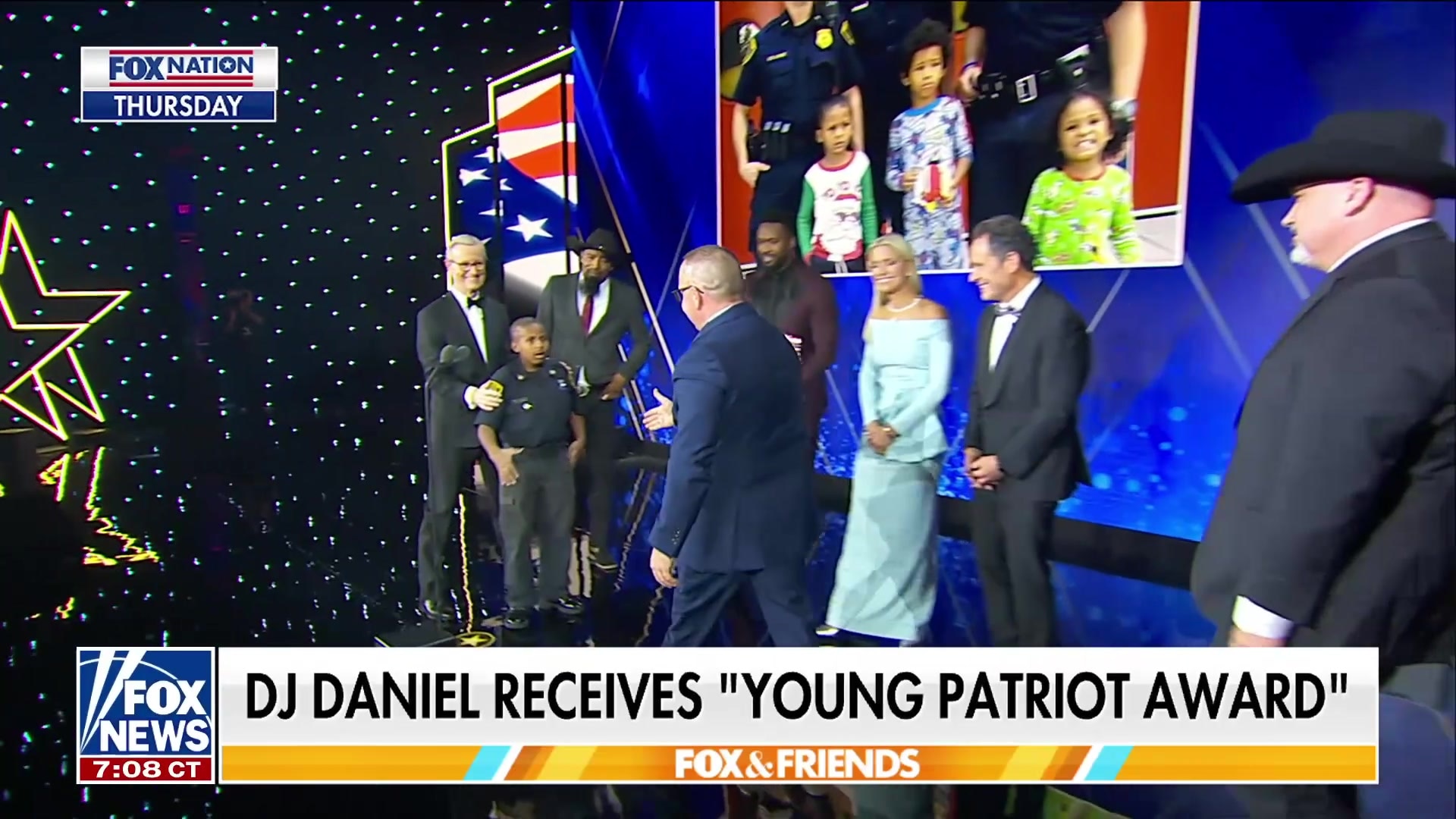 Young Patriot DJ Daniel, battling brain cancer, receives award and comforting hug from Erika Kirk