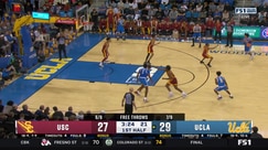 Xavier Booker hammers down a dunk from Skyy Clark's lob