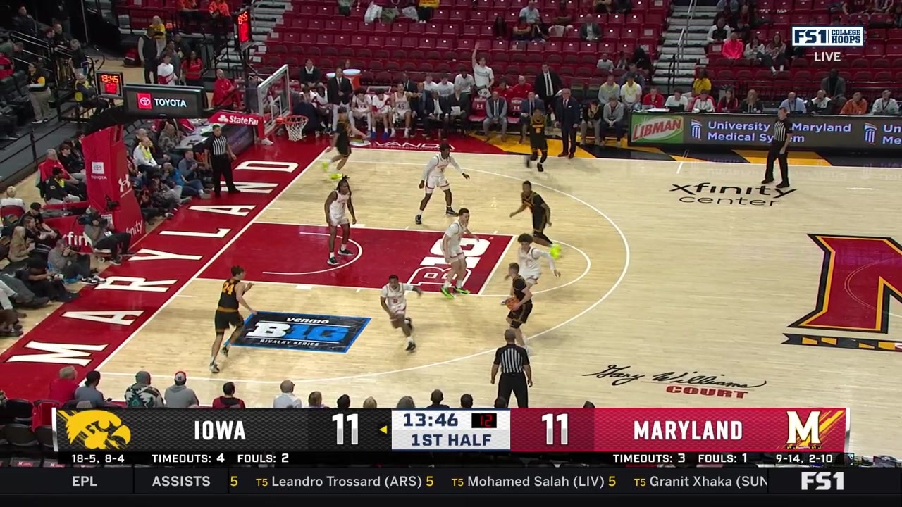 Tate Sage dunks the ball for Iowa