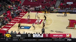 Tate Sage dunks the ball for Iowa