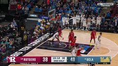 Xavier Booker soars for a powerful two-hand slam