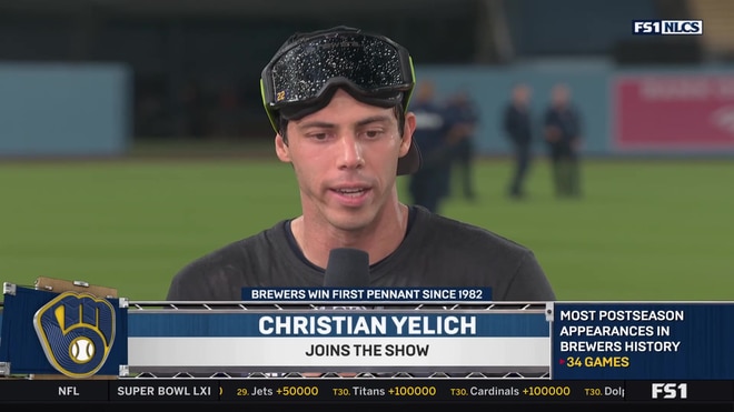 Christian Yelich crowns David Ortiz with iconic cheesehead after NLCS win