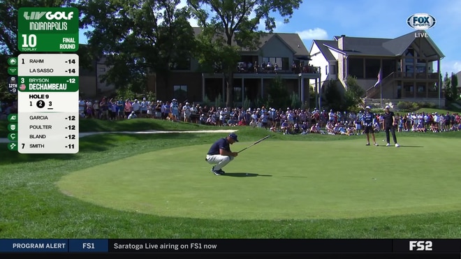 Jon Rahm and Bryson DeChambeau seek birdie putts on the ninth green