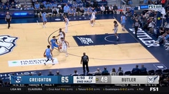 Jasen Green hammers home a dunk off a Nik Graves assist