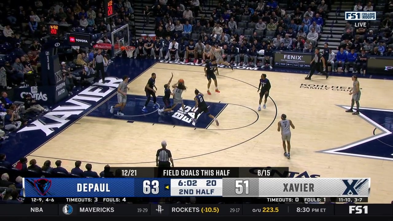 Tre Carroll connects on a turnaround hook shot