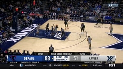 Tre Carroll connects on a turnaround hook shot