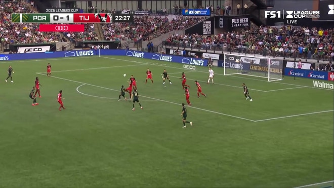 James Pantemis makes a diving save to deny Efraín Álvarez
