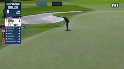 Dustin Johnson rattles in a birdie putt on Hole 11