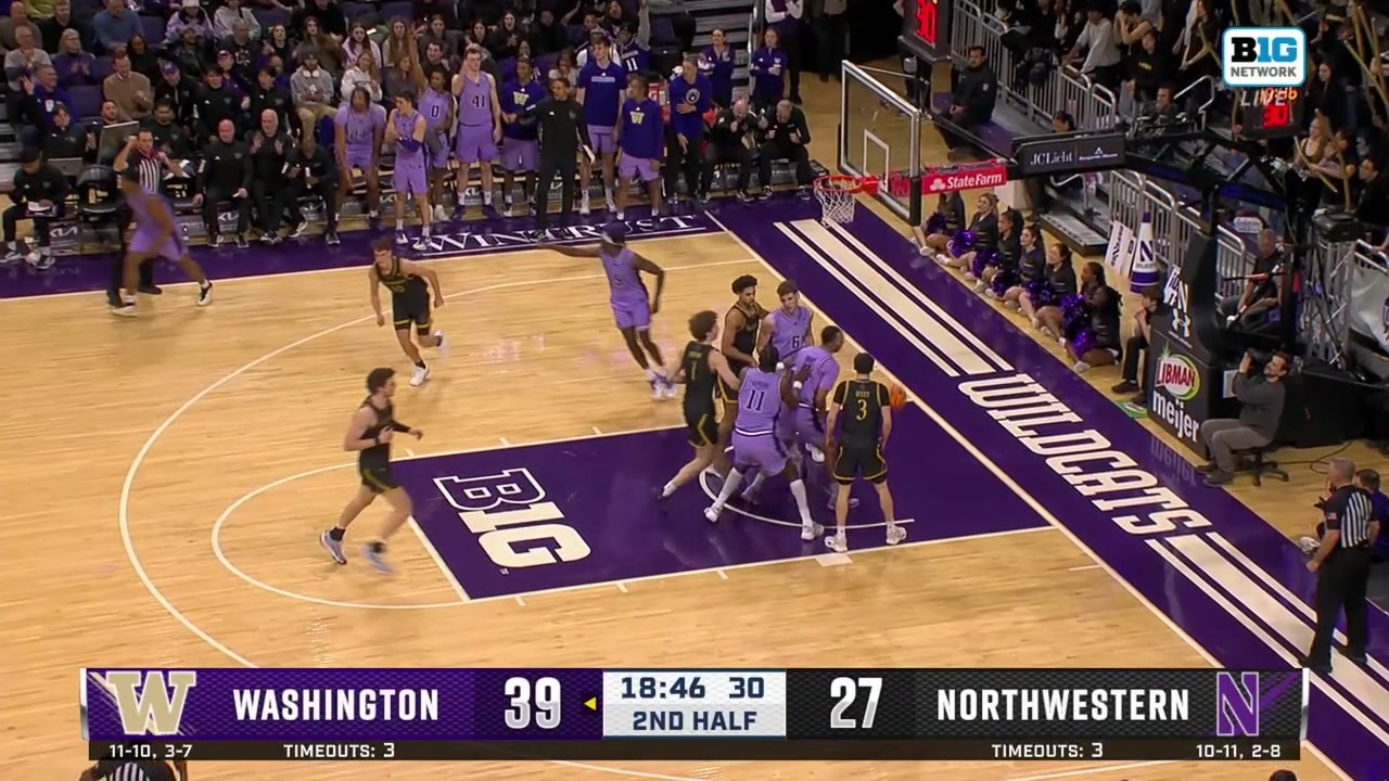 Wesley Yates III hits a three-point jump shot