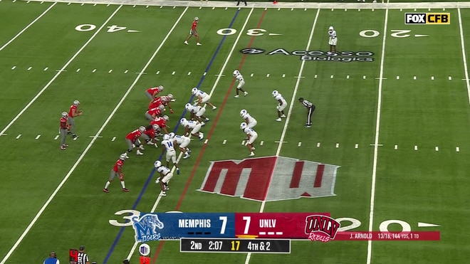 Jackson Arnold converts on fourth down with a pass to Jai'Den Thomas