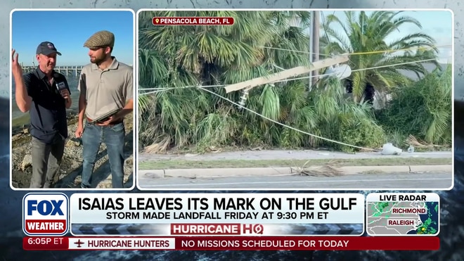 Robert Ray and Jarrod Maloney survey Hurricane Isaias damage in Florida